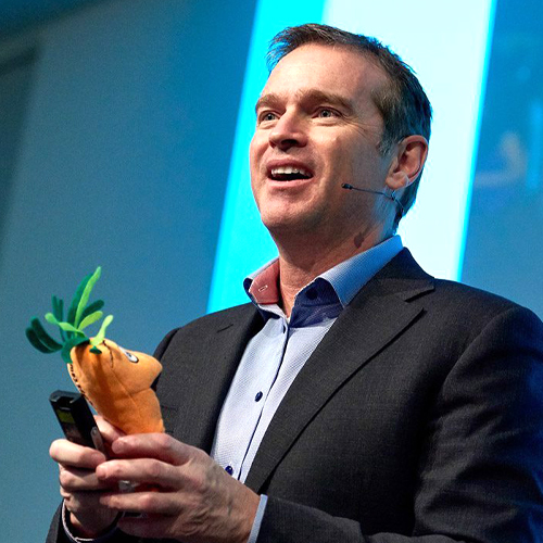 Remarkable Speakers Bureau Adrian Gostick onstage The Carrot Principle new featured image