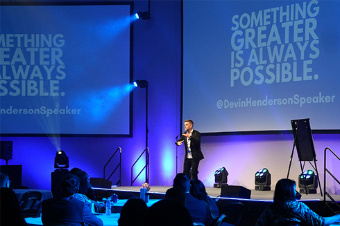Remarkable! A Speakers Bureau Devin Henderson onstage ATI something greater is always possible