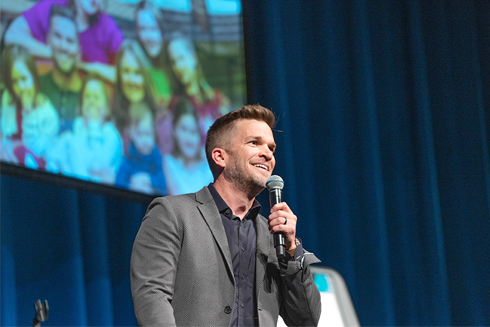 Remarkable! A Speakers Bureau Devin Henderson onstage2