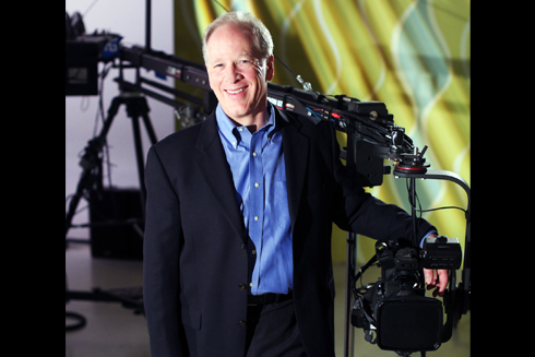 Bill Stainton backstage with camera