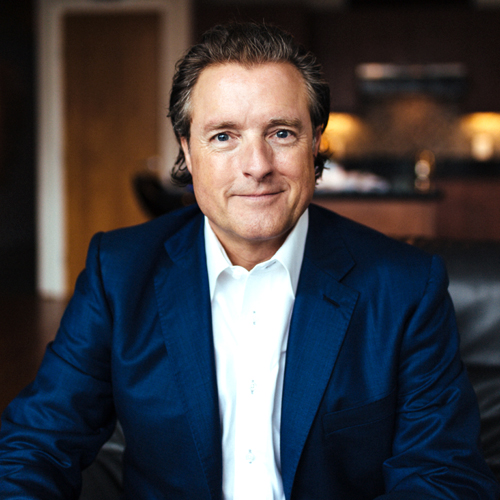 Remarkable Speakers Bureau Daren Martin featured image headshot sitting on couch