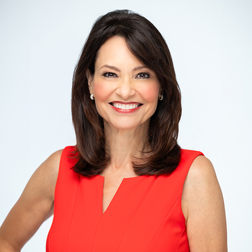 Remarkable! A Speakers Bureau Liz Brunner professional in red dress